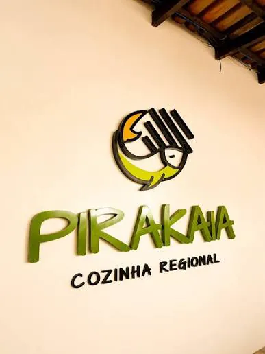 Logo do Pirakaia Cozinha Regional na parede